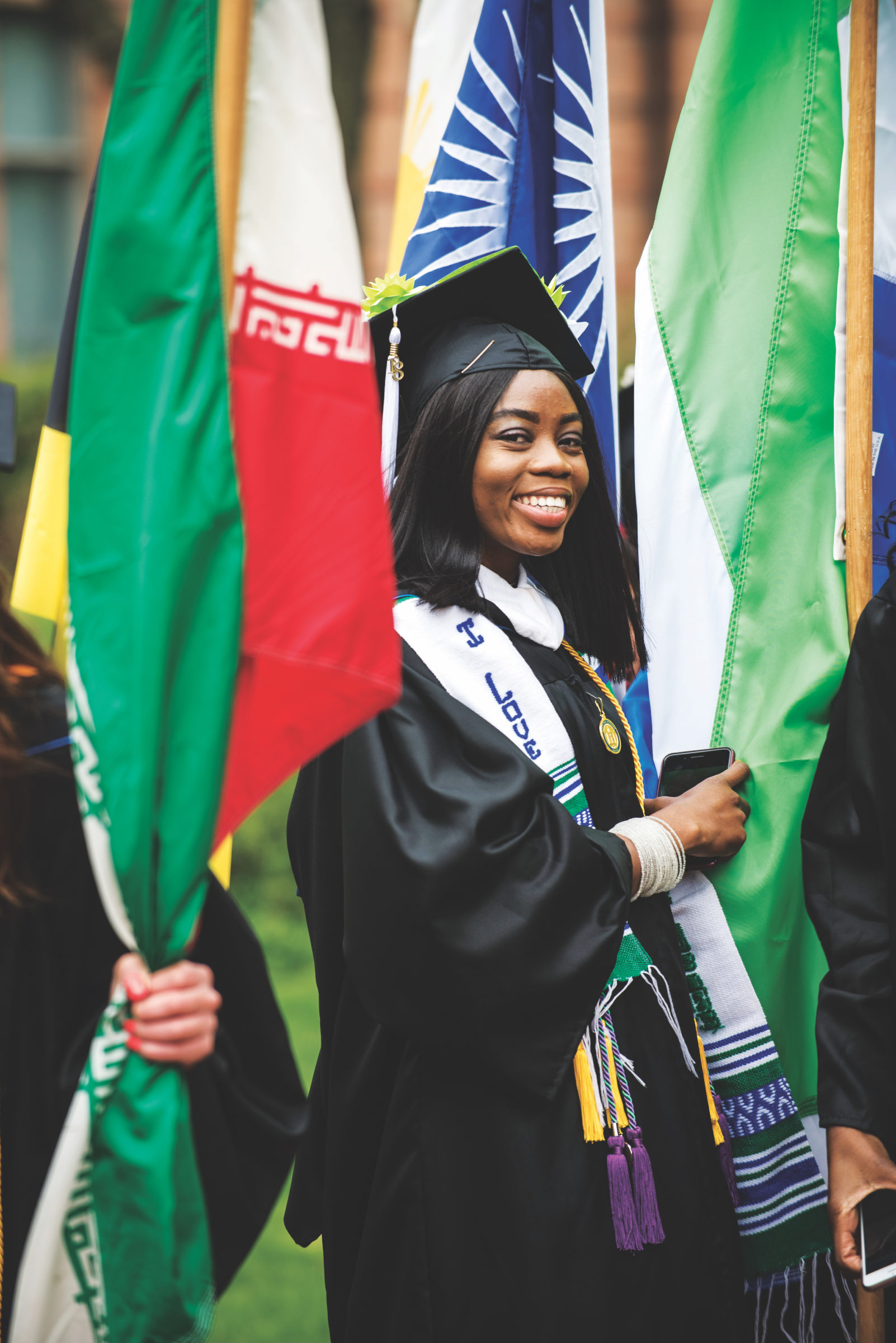 International graduates led a procession of flags representing the 22 countries in which the class of ’18 were born or resided.