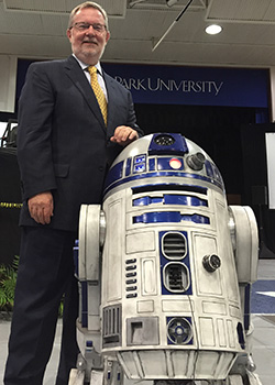 Dr. David Parkyn with R2D2 at the In Search of Genius Event