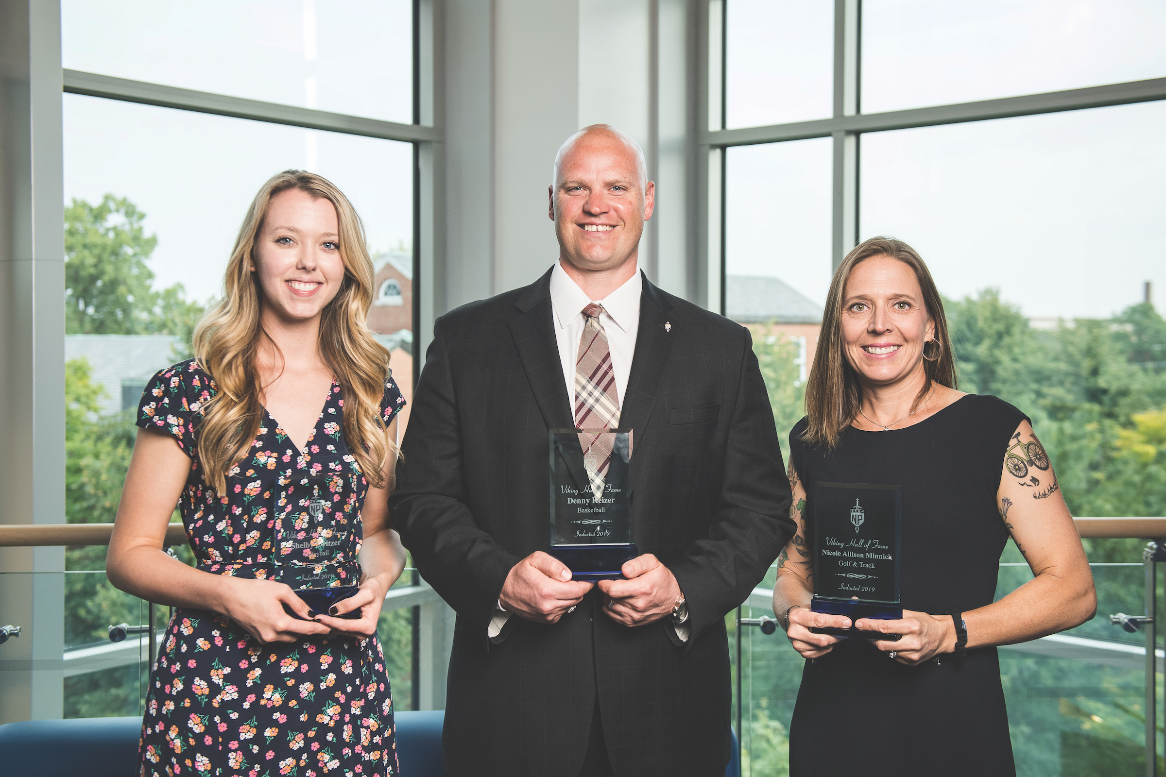 Shelby Switzer C’14, Denny Keizer C’99, and Nicole Minnick C’98 were inducted into the Viking Hall of Fame.