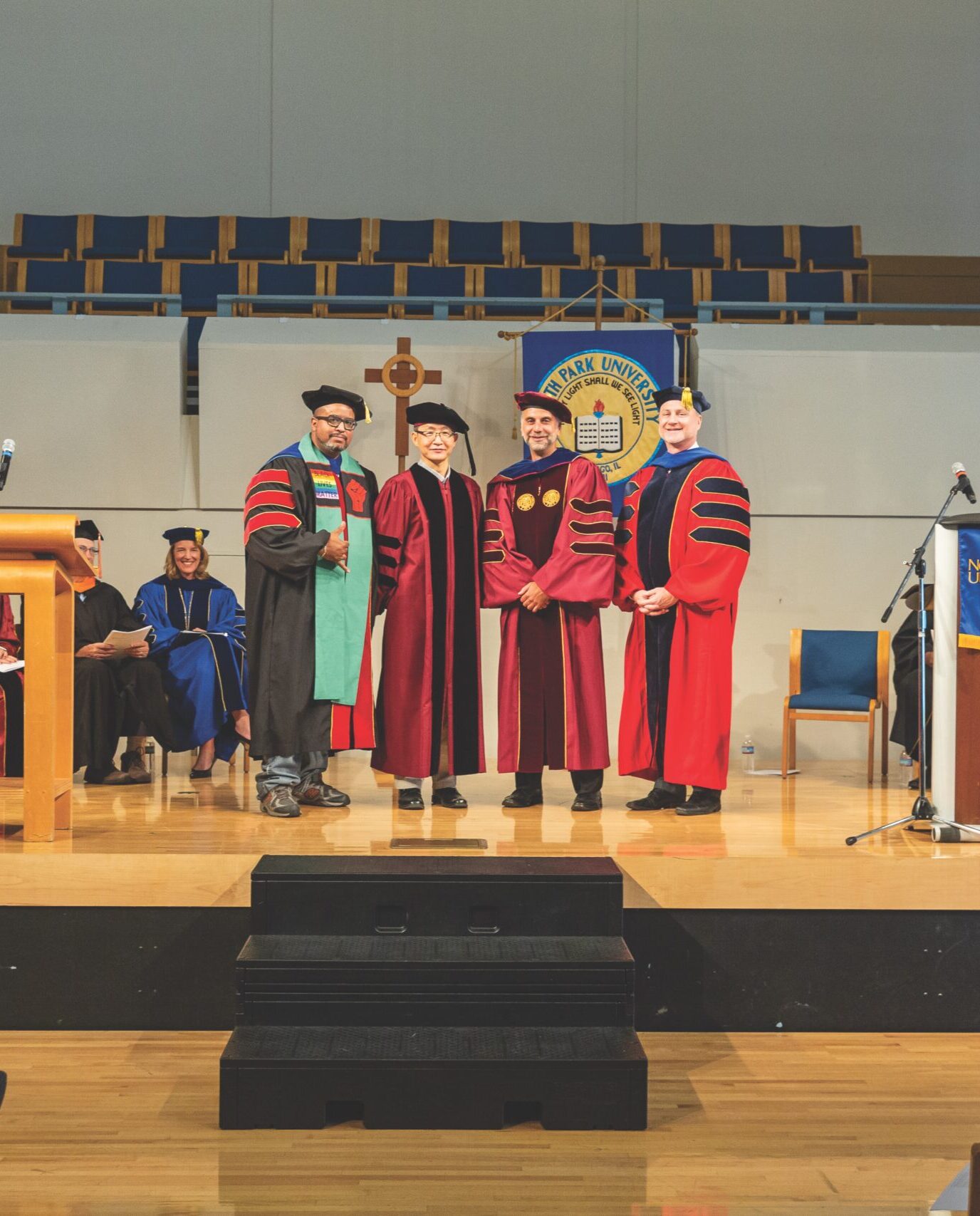 Academic Convocation faculty on stage