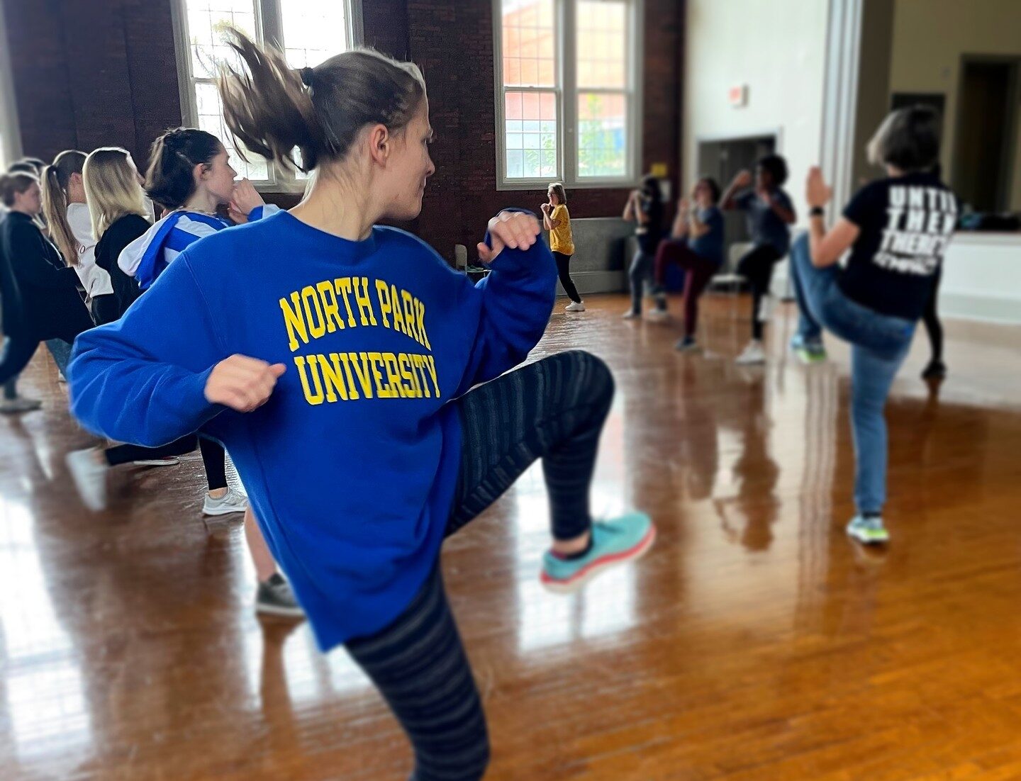 Students learn self-defense during a workshop.